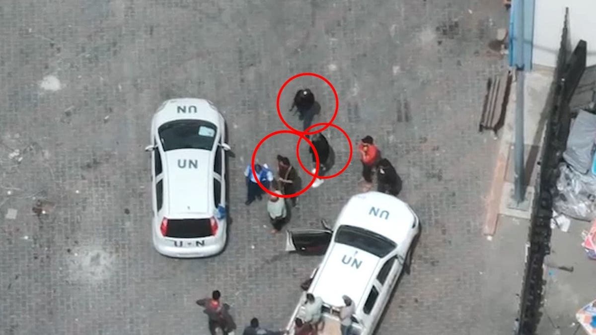Photos released by the Israeli Defense Forces show three individuals that the Israeli military claims are Hamas terrorists inside a UNRWA compound in Rafah.(IDF)
